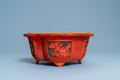 A Chinese quatrefoil jardini&egrave;re in red and black lacquer, Qianlong