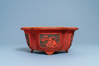 A Chinese quatrefoil jardini&egrave;re in red and black lacquer, Qianlong