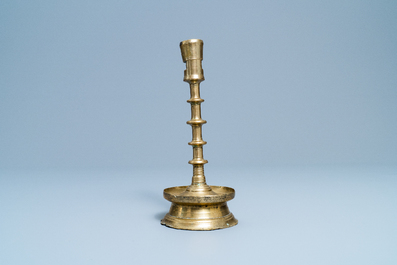 A Flemish or Dutch knotted bronze candlestick, 15th C.