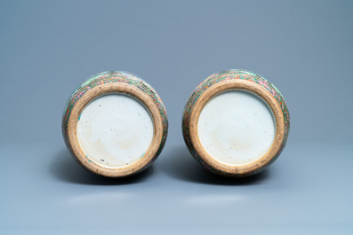 A pair of Chinese Canton famille rose rouleau vases, 19th C.