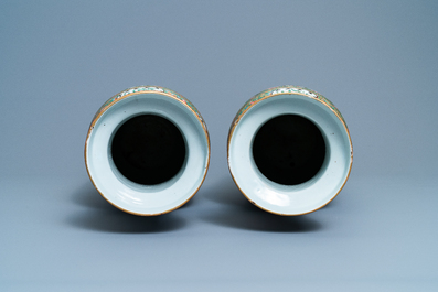 A pair of Chinese Canton famille rose rouleau vases, 19th C.