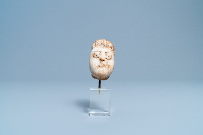 A Romanesque marble head of a man, 14/15th C.
