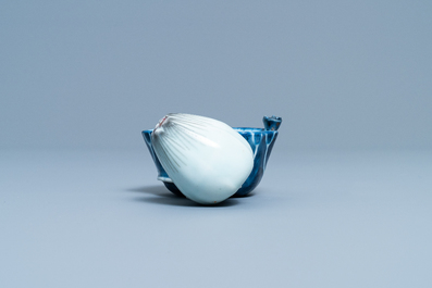 A Chinese blue, white and copper red 'crab in lotus' water dropper, Kangxi