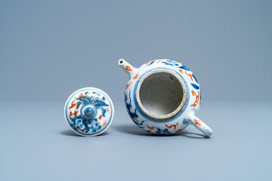 A rare Chinese blue, white, iron red and gilt tripod teapot and cover, Kangxi