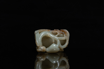 A Chinese mottled celadon and brown jade peach-form brush washer, Qing