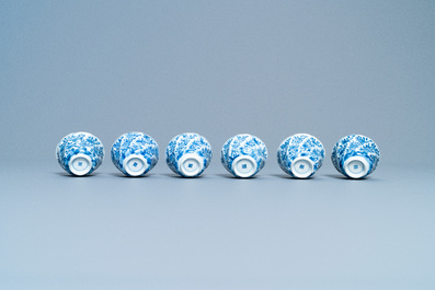 A varied collection of Chinese blue and white cups and saucers, Kangxi