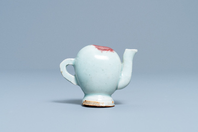 A Chinese miniature peach-shaped cadogan teapot with junyao glaze, Kangxi/Qianlong