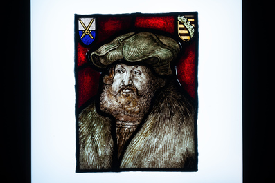 Two stained glass fragments, Flanders or France, one dated 1532