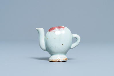 A Chinese miniature peach-shaped cadogan teapot with junyao glaze, Kangxi/Qianlong