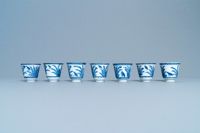 Seven Chinese blue and white cups and saucers, Kangxi