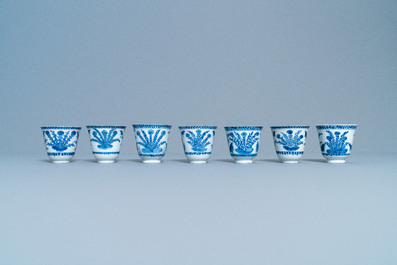Seven Chinese blue and white cups and saucers, Kangxi