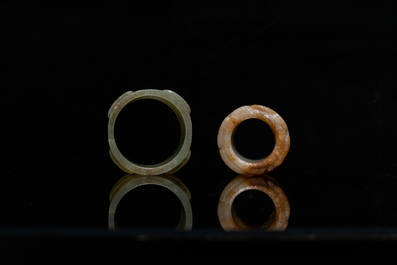Two Chinese jade archer's rings, 18/19th C.