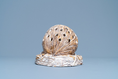 A polychrome faience flower holder shaped as a hedgehog, Northern France, 18/19th C.