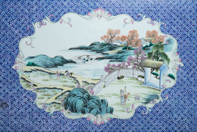 A large Chinese famille rose plaque in a lacquered wooden frame, 19th C.