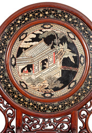 A massive Chinese carved wooden screen with a round famille verte plaque and polychrome lacquer, 19th C.