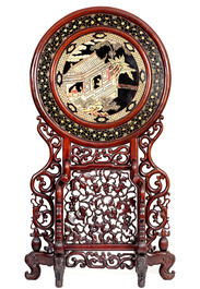 A massive Chinese carved wooden screen with a round famille verte plaque and polychrome lacquer, 19th C.