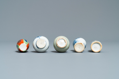 Fifteen Chinese mostly blue and white miniature vases, Kangxi