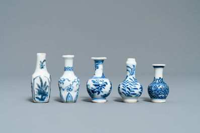 Fifteen Chinese mostly blue and white miniature vases, Kangxi