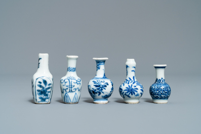 Fifteen Chinese mostly blue and white miniature vases, Kangxi