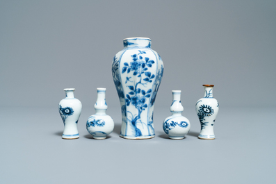 Fifteen Chinese mostly blue and white miniature vases, Kangxi