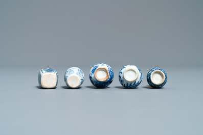 Fifteen Chinese mostly blue and white miniature vases, Kangxi