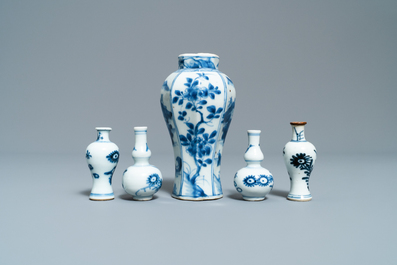 Fifteen Chinese mostly blue and white miniature vases, Kangxi