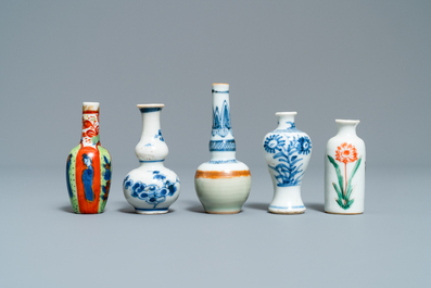 Fifteen Chinese mostly blue and white miniature vases, Kangxi
