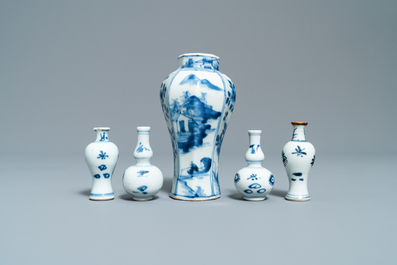 Fifteen Chinese mostly blue and white miniature vases, Kangxi