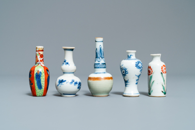 Fifteen Chinese mostly blue and white miniature vases, Kangxi