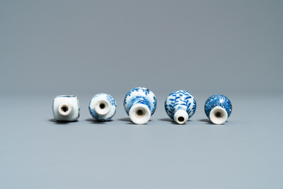Fifteen Chinese mostly blue and white miniature vases, Kangxi