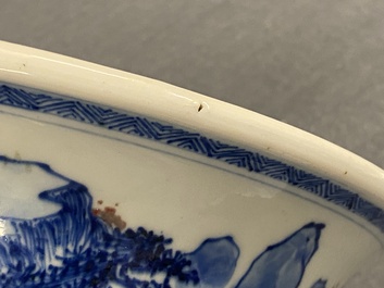 A fine Chinese blue, white and copper red 'Master of the Rocks' brush pot, Kangxi