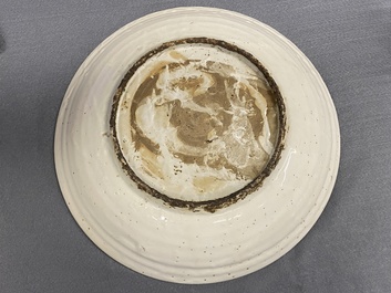 A Chinese Swatow dish with a Buddhist lion, Ming