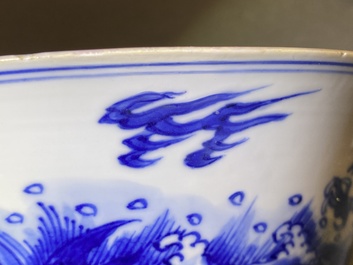 A Chinese blue and white 'dragon and carps' bowl, Xuande mark, Kangxi