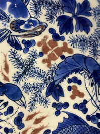 A Chinese blue, white and copper red 'crab and fish' dish, Kangxi
