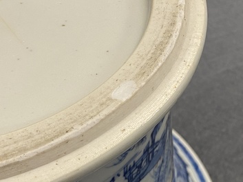 A fine Chinese blue, white and copper red 'Master of the Rocks' brush pot, Kangxi