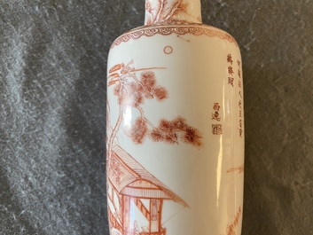 Un vase de forme rouleau en porcelaine de Chine &agrave; d&eacute;cor d'un paysage en rouge de fer, Kangxi