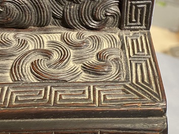 Un petit cabinet en bois sculpt&eacute; &agrave; d&eacute;cor de dragons, Chine, R&eacute;publique