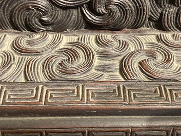 Un petit cabinet en bois sculpt&eacute; &agrave; d&eacute;cor de dragons, Chine, R&eacute;publique