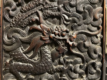 Un petit cabinet en bois sculpt&eacute; &agrave; d&eacute;cor de dragons, Chine, R&eacute;publique