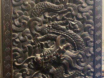 Un petit cabinet en bois sculpt&eacute; &agrave; d&eacute;cor de dragons, Chine, R&eacute;publique