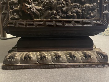 Un petit cabinet en bois sculpt&eacute; &agrave; d&eacute;cor de dragons, Chine, R&eacute;publique
