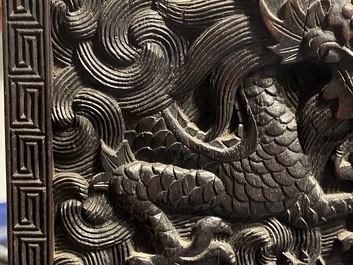 Un petit cabinet en bois sculpt&eacute; &agrave; d&eacute;cor de dragons, Chine, R&eacute;publique