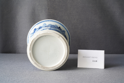 A fine Chinese blue, white and copper red 'Master of the Rocks' brush pot, Kangxi