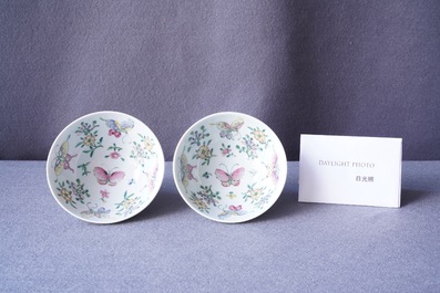 A pair of Chinese famille rose rice grain pattern 'butterfly' bowls, Qianlong mark, 18/19th C.