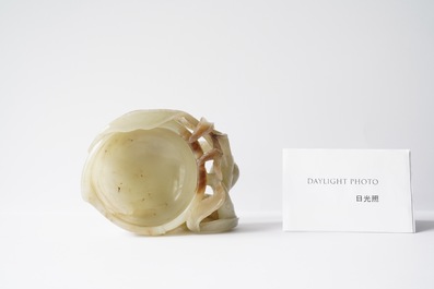 A Chinese mottled celadon and brown jade peach-form brush washer, Qing