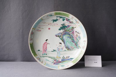 A Chinese famille rose charger with figures in a landscape, Yongzheng