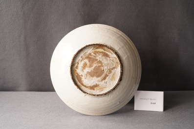 A Chinese Swatow dish with a Buddhist lion, Ming