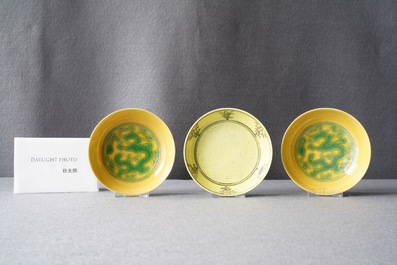 Three Chinese yellow-ground saucer dishes, 19/20th C.