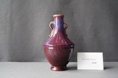 A Chinese monochrome flamb&eacute;-glazed vase, incised Qianlong mark, 18/19th C.