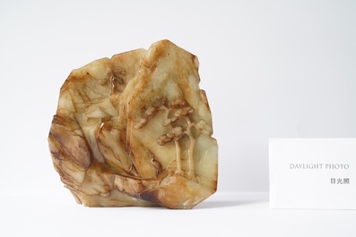 A Chinese mottled white jade mountain landscape with a fishing boat, Qing
